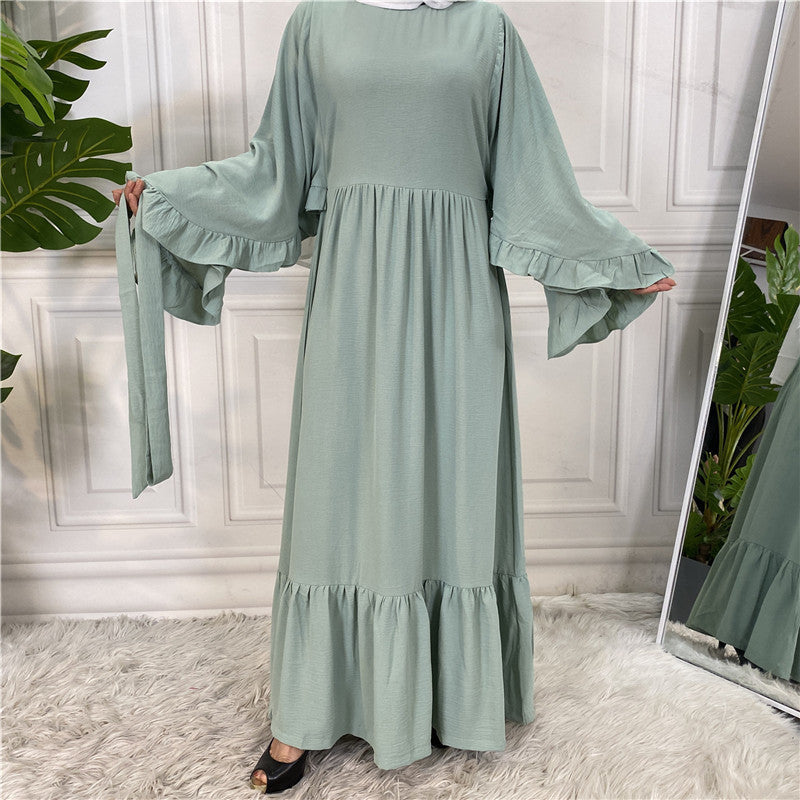 Robe musulmane élégante de couleur unie avec patchwork pour femme