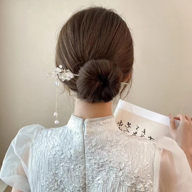 Maiglöckchen-Blumen-Stufenhaarnadel mit High-End-Sinn