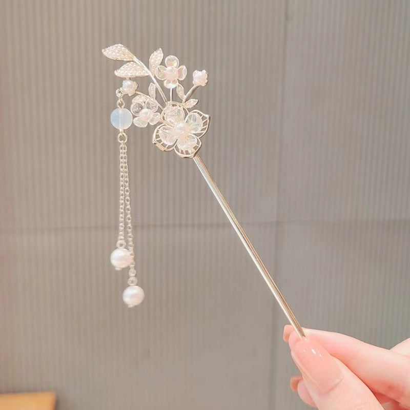 Maiglöckchen-Blumen-Stufenhaarnadel mit High-End-Sinn
