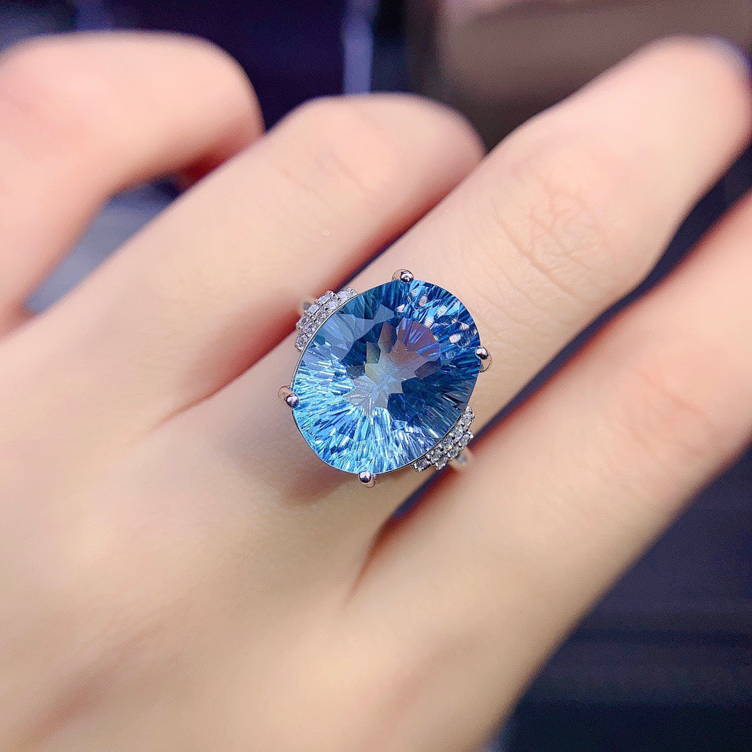 Bague pour femme en argent sterling incrustée de topaze bleue
