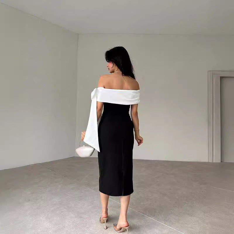 Robe de cocktail élégante femme, épaules dénudées, nœud, bicolore noir et blanc