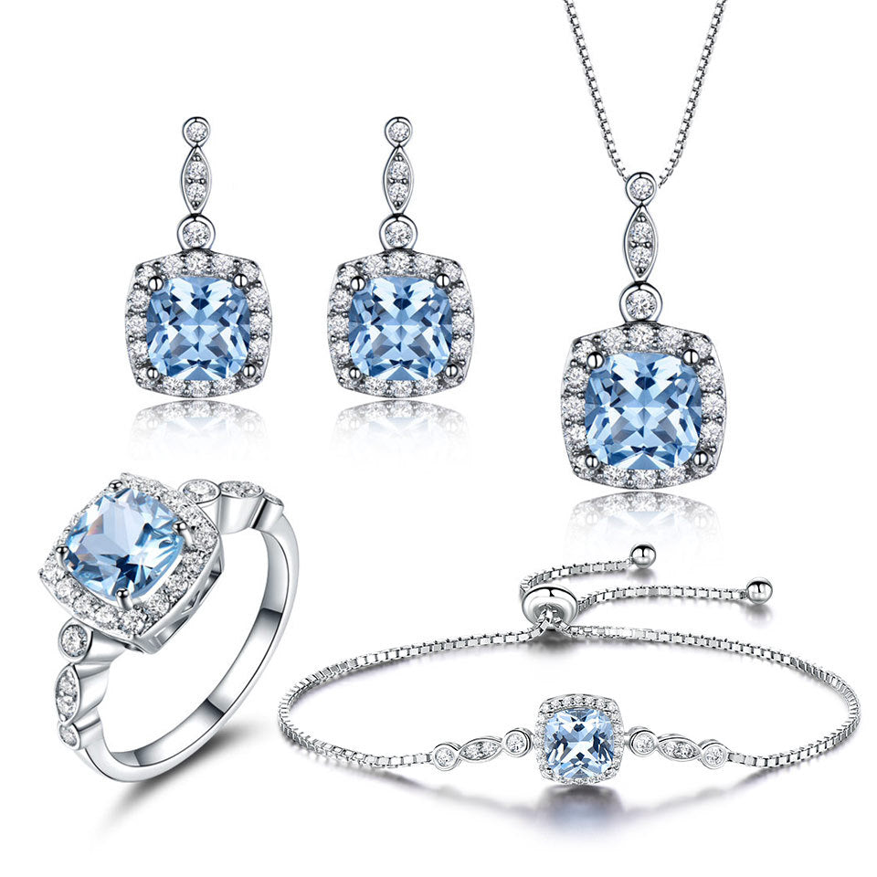 Halskette aus 925er Sterlingsilber, hellblauer Topas, vierteiliges Set