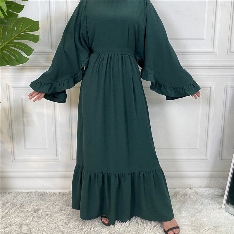 Robe musulmane élégante de couleur unie avec patchwork pour femme