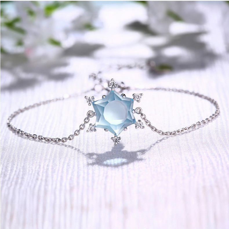 Sky blue topaz snowflake bracelet