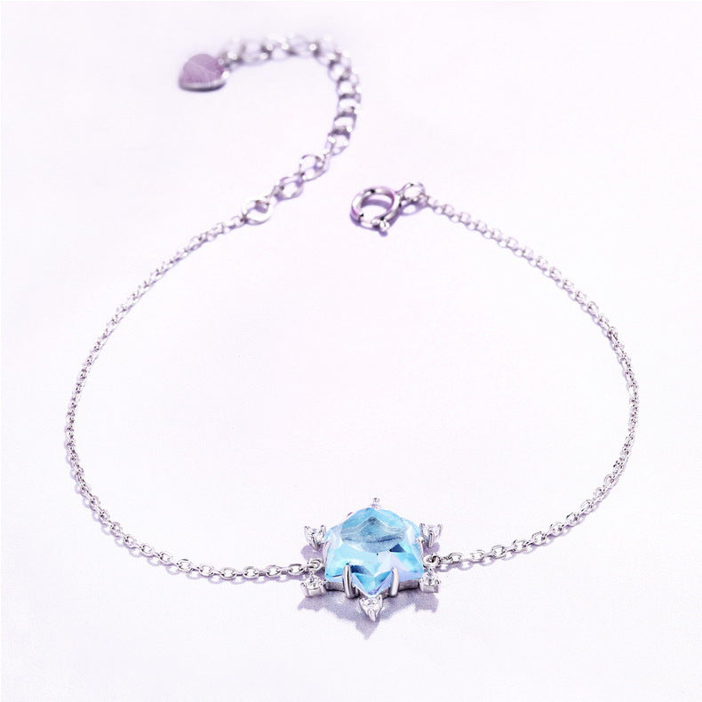 Sky blue topaz snowflake bracelet