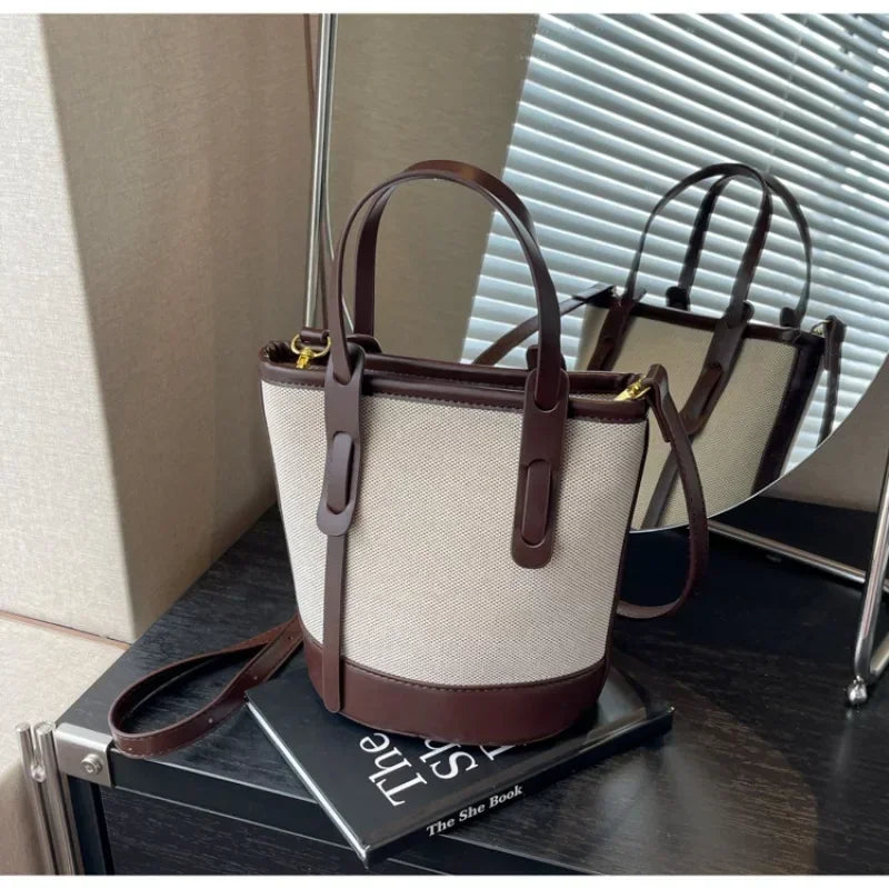 2025 Fashion Versatile PU Canvas Bucket Shoulder and Crossbody Bags Simple Casual Sense of Luxury Retro Handbags for Women