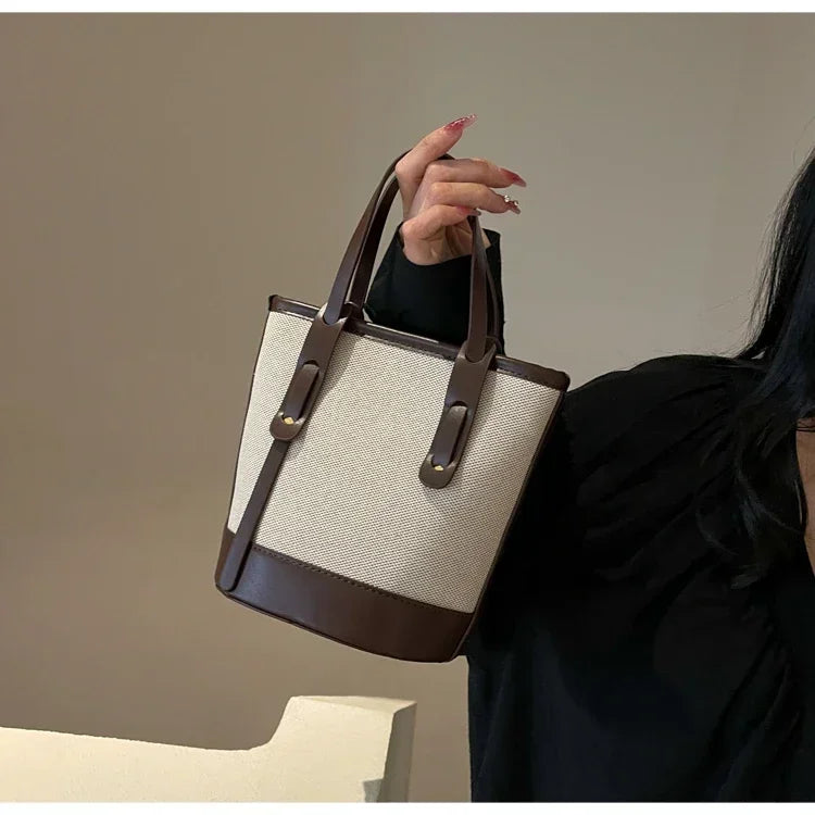 2025 Fashion Versatile PU Canvas Bucket Shoulder and Crossbody Bags Simple Casual Sense of Luxury Retro Handbags for Women