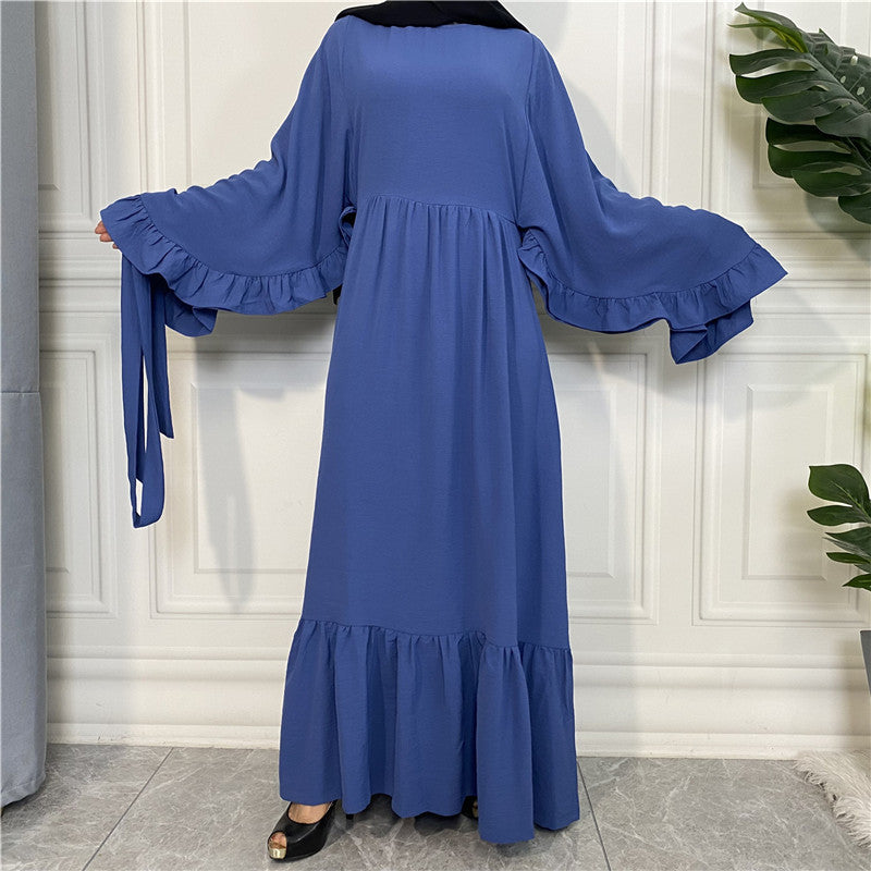 Robe musulmane élégante de couleur unie avec patchwork pour femme