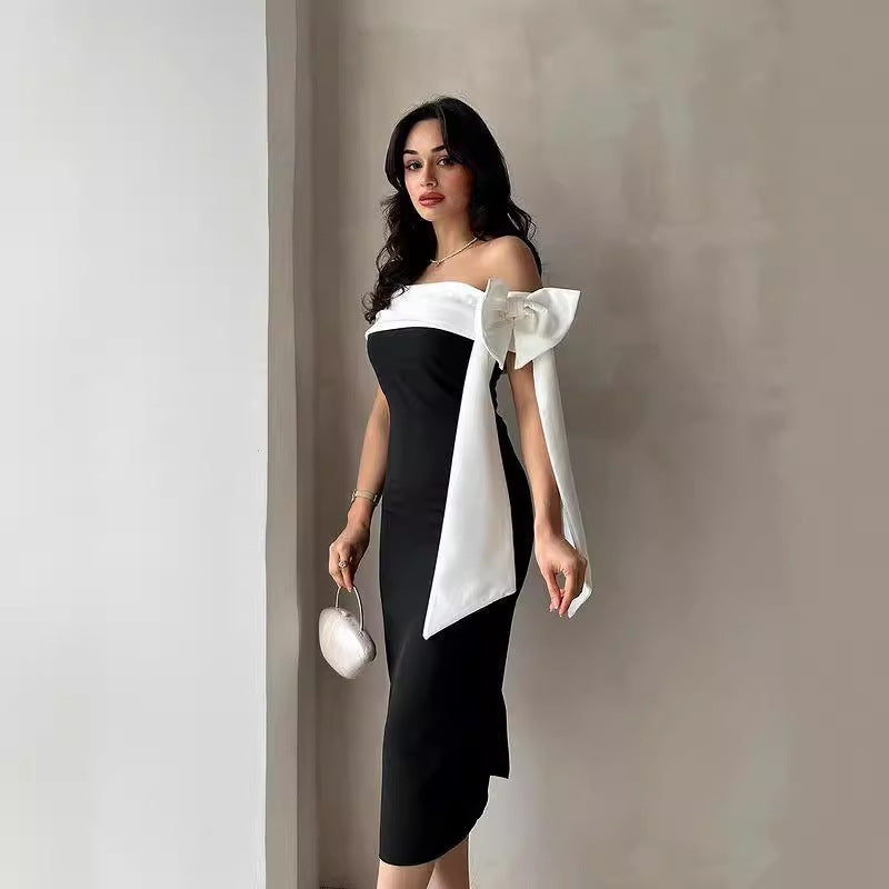 Robe de cocktail élégante femme, épaules dénudées, nœud, bicolore noir et blanc