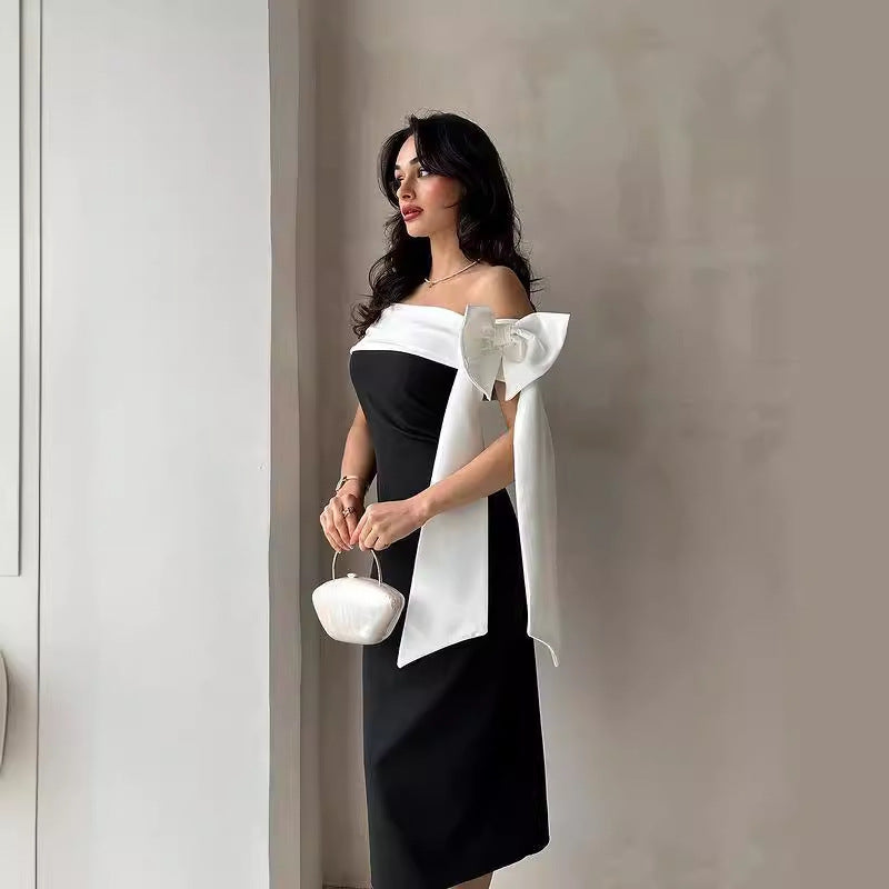Robe de cocktail élégante femme, épaules dénudées, nœud, bicolore noir et blanc