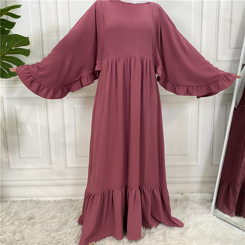 Robe musulmane élégante de couleur unie avec patchwork pour femme